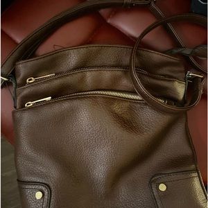 Brown awesome bag. Looks like leather